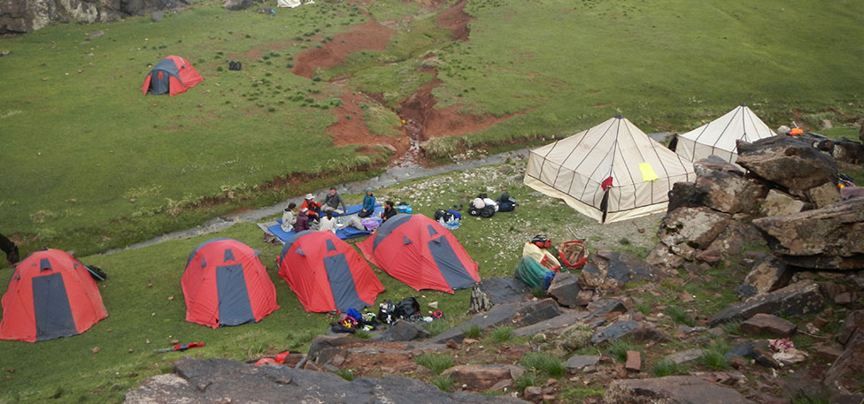 Trekking and adventure - Trekking in the Atlas Mountains of Tessaout - Morocco Bivouac along the trekking route in the Central Atlas mountains - Morocco Tour
